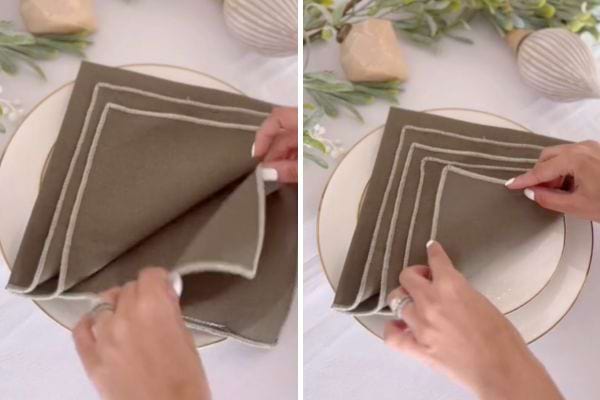 La serviette grise est retournée pour former la base du sapin.