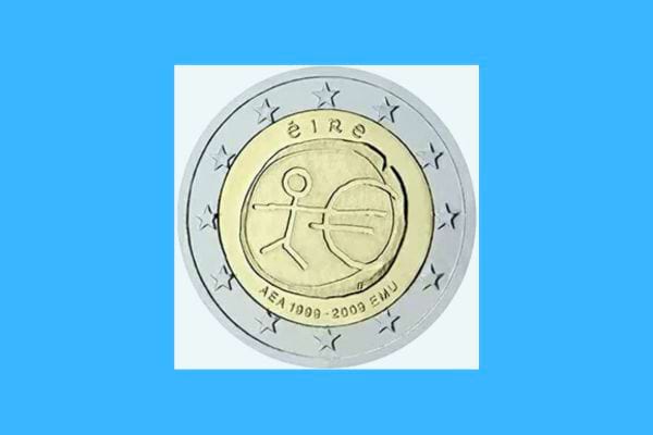 Pièce de 2 euros irlandaise célébrant l'UEM avec une figure et une monnaie stylisée.