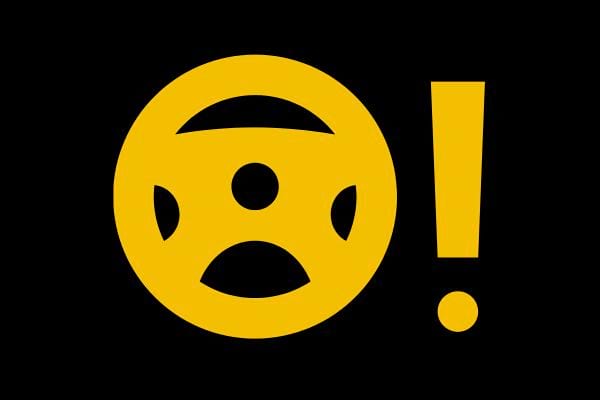 Symbole jaune, point d'exclamation dans un volant, pouvant indiquer un problème avec le système de direction assistée.