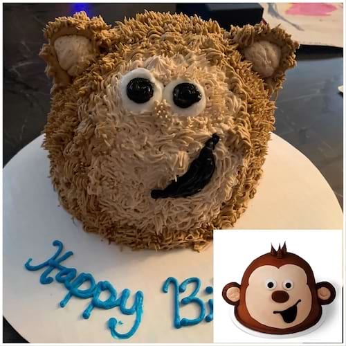 Gâteau d'anniversaire inspiré d'un singe, ressemblance approximative, expression comique.