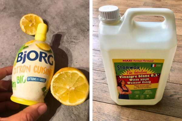 Bouteille de jus de citron à côté d'une demi-citron avec un jerrican de vinaigre blanc à côté.