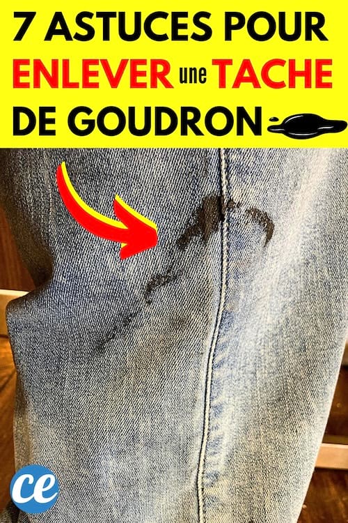 Une tache de goudron noir sur un jean qui doit être nettoyé