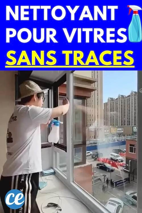 Homme asiatique qui nettoie une vitre