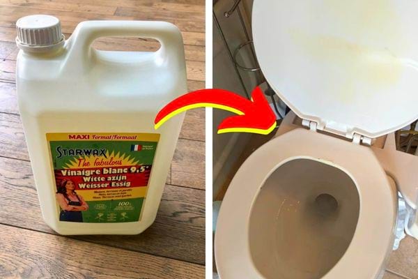 Un bidon de vinaigre blanc à côté de toilettes propres.