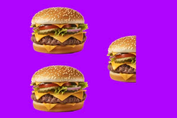Trois cheeseburgers sur fond violet