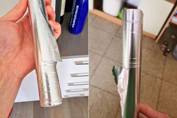 Un rouleau de papier alu qui est déchiré 