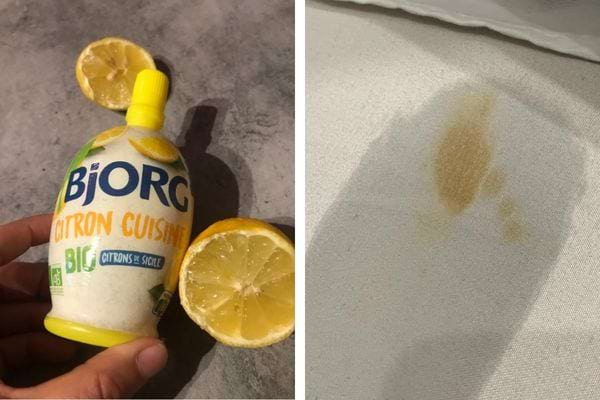Bouteille de citron Bjorg avec une tache sur du tissu.