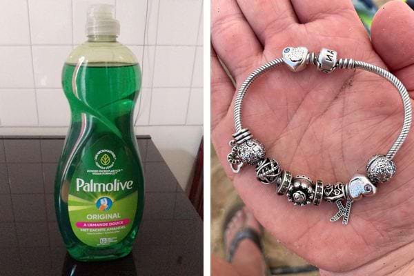 Bouteille de liquide vaisselle Palmolive et bracelet Pandora.