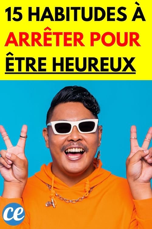 Un homme asiatique faisant deux signes peace avec ses deux mains