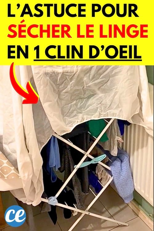 Un drap sur un étendoir et un radiateur pour faire sécher le linge rapide