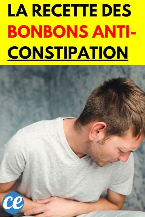 Un homme qui se tient le ventre en souffrant 