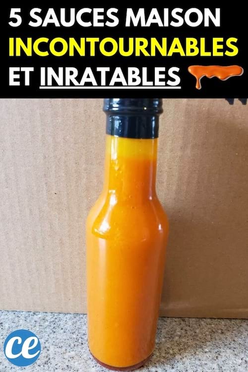 Une bouteille orange de sauce maison