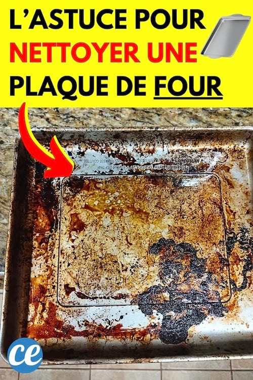 Une plaque de four très sale qui a besoin d'être nettoyée rapidement