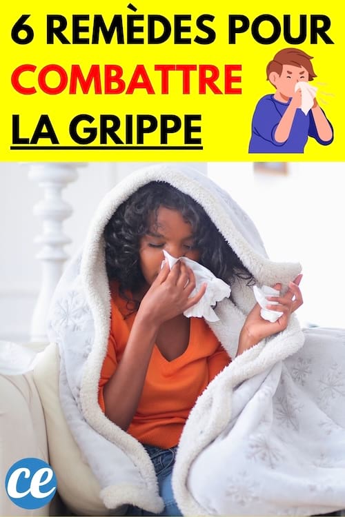 Femme avec un haut orange sur son canapé et une couette blanche sur sa tête qui se mouche