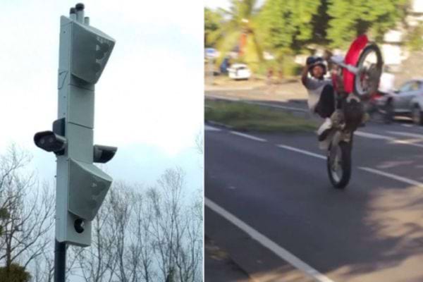 Radar en bordure de route capturant une moto en wheelie.