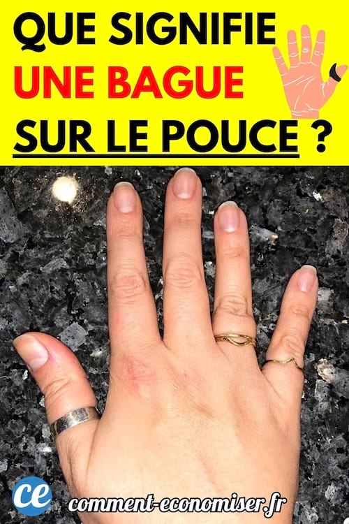 Une main ayant trois bagues sur des doigts différents