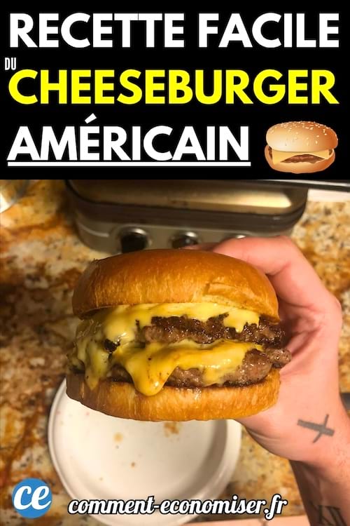Une main tenant un cheeseburger bien garni avec deux steaks et du fromage fondu.