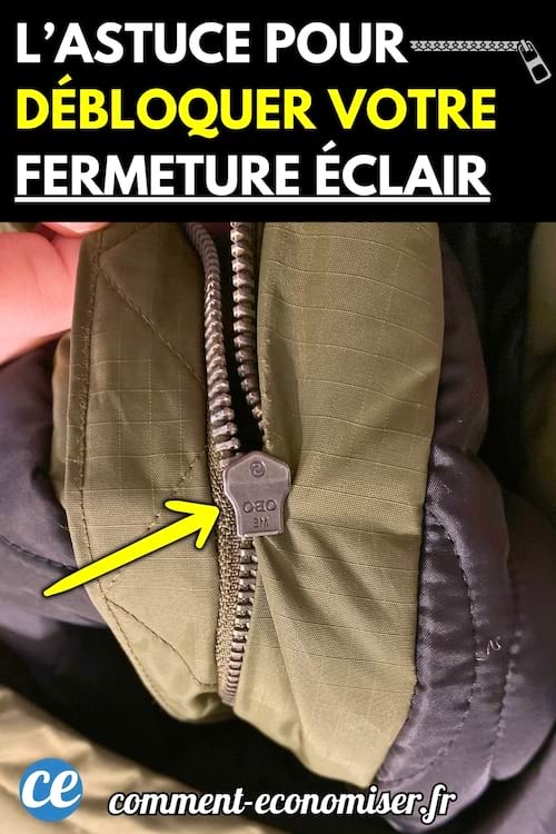 Gros plan sur une fermeture éclair coincée d’une veste verte.