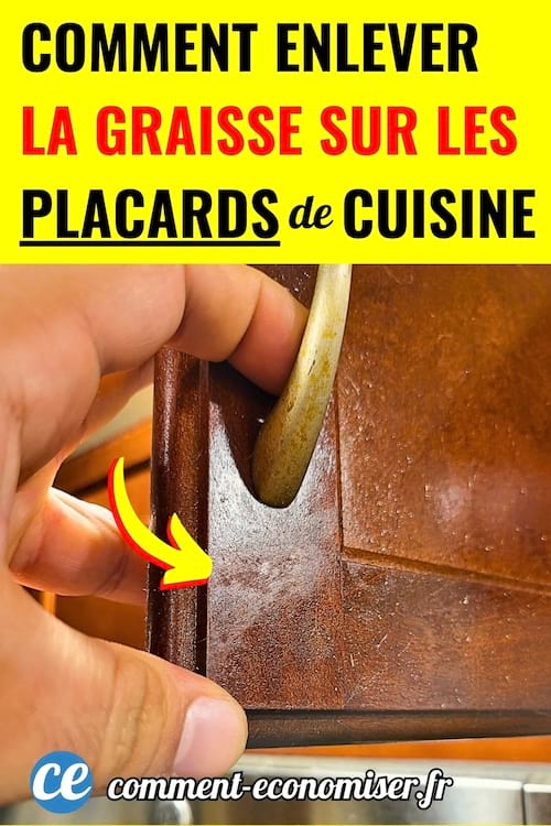 De la graisse sur un placard marron en bois collant 