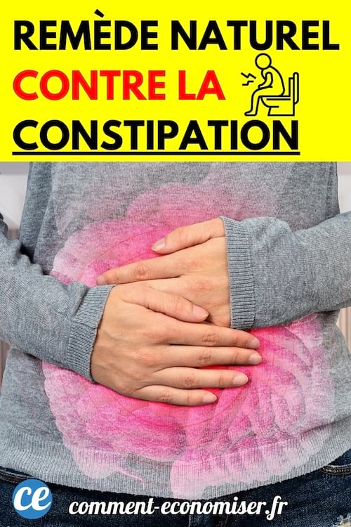 Une personne en pull gris tenant son ventre avec les mains, une zone rose indiquant une douleur abdominale.