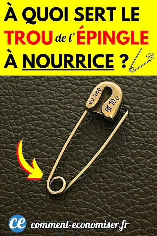 Une épingle à nourrice avec un trou sur du cuir noir