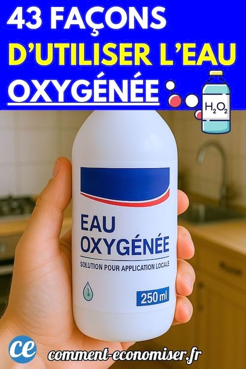 Une main tenant un flacon de 250 ml d’eau oxygénée dans une cuisine.