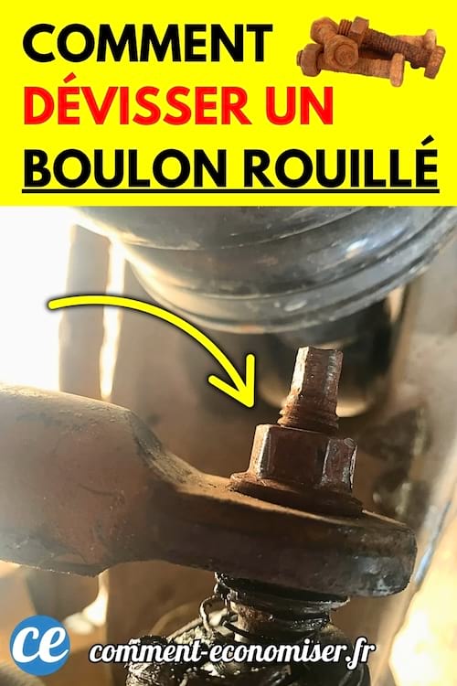 Gros plan sur un boulon rouillé difficile à dévisser avec une clé usée