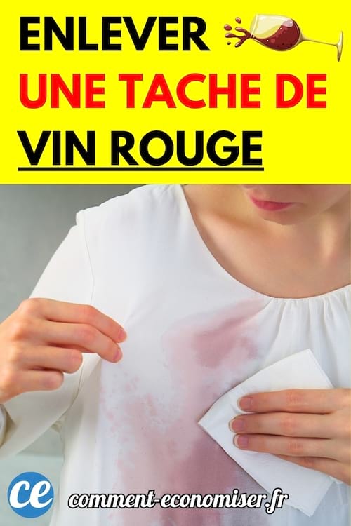 Femme tamponnant une tache de vin rouge sur un haut blanc.