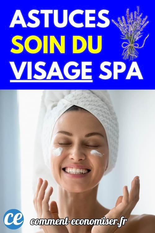 Femme souriante avec une serviette autour de la tête appliquant une crème sur son visage.