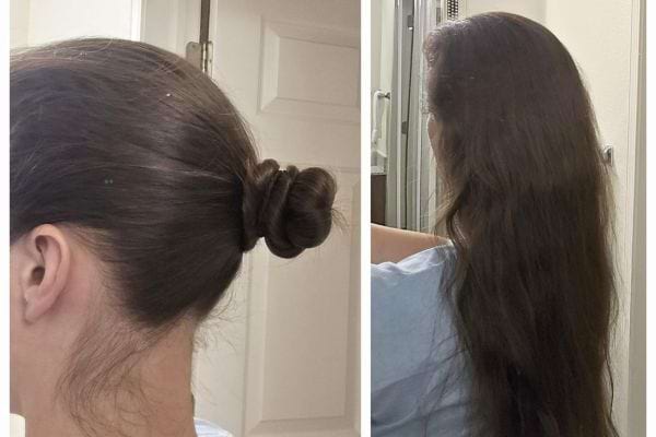 Cheveux attachés en chignon puis détachés, longs et lisses.