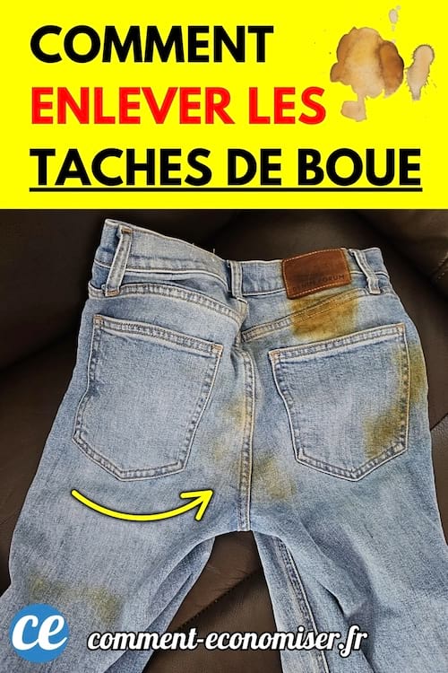 Un jean bleu clair taché de boue sur l’arrière, posé sur un canapé sombre.