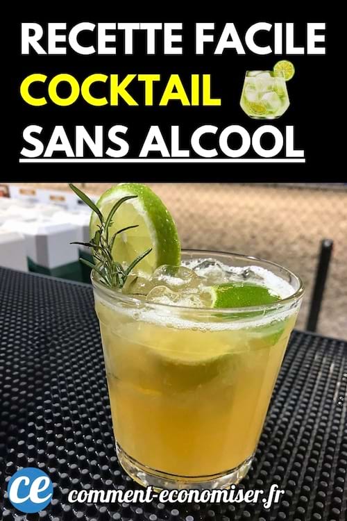 Un cocktail sans alcool dans un verre avec des tranches de citron vert et du romarin.