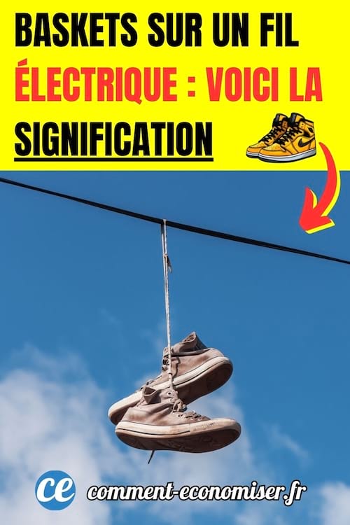 une paire de vieilles baskets suspendues à un fil électrique