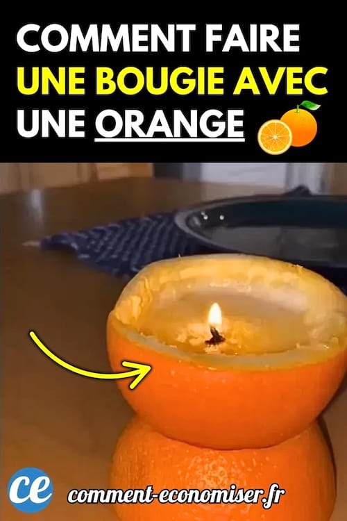 Une orange coupée en deux utilisée comme bougie naturelle avec une mèche allumée au centre.