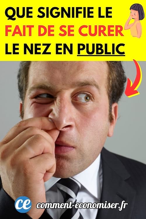 un homme en costume se cure le nez