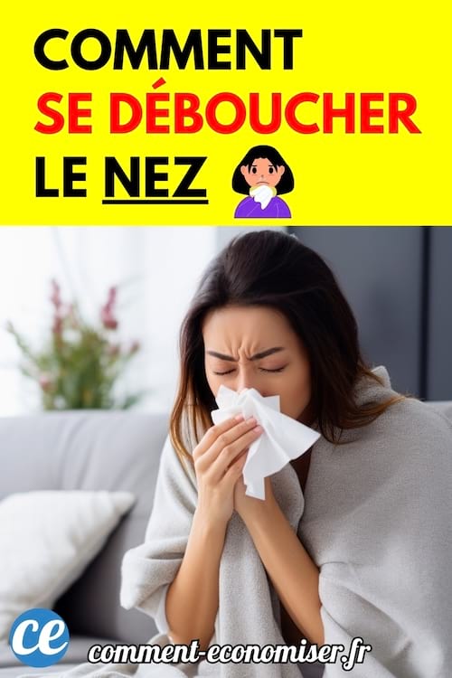 Femme enroulée dans une couverture sur un canapé, se mouchant avec un mouchoir en papier.