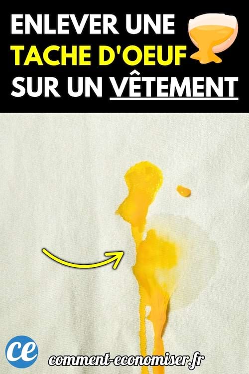 Tache de jaune d’œuf fraîchement renversée sur un tissu blanc, formant une traînée éclatante.