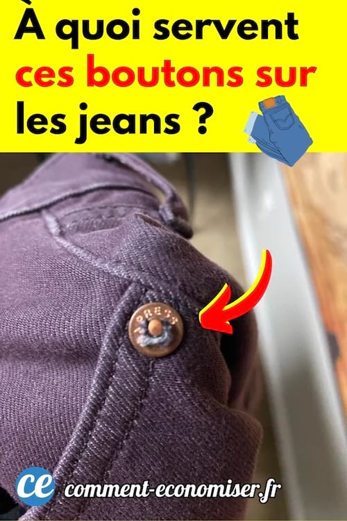 Un petit bouton métallique sur un jeans bleu
