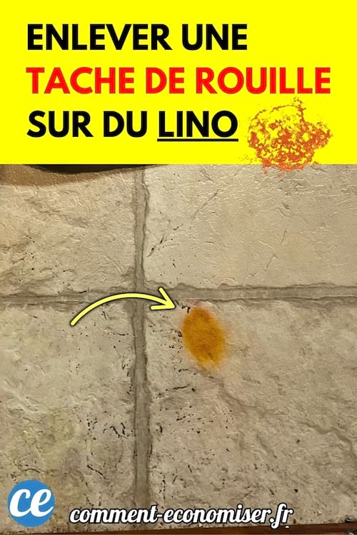 Un sol en lino beige avec une tache de rouille orange.
