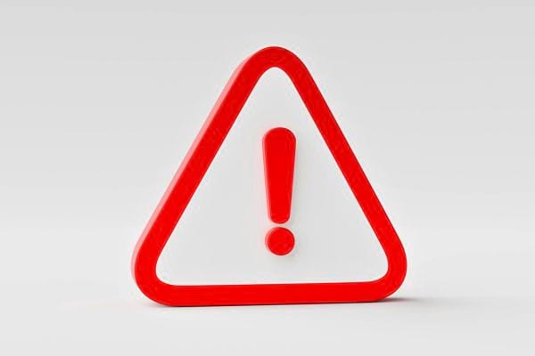 Panneau triangulaire rouge et blanc avec point d’exclamation au centre.