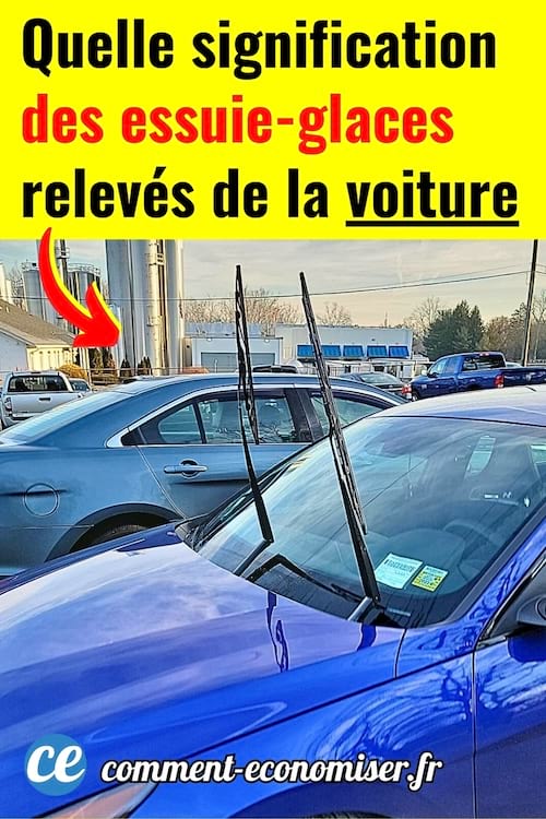 Une voiture bleue avec des essuie-glaces relevés