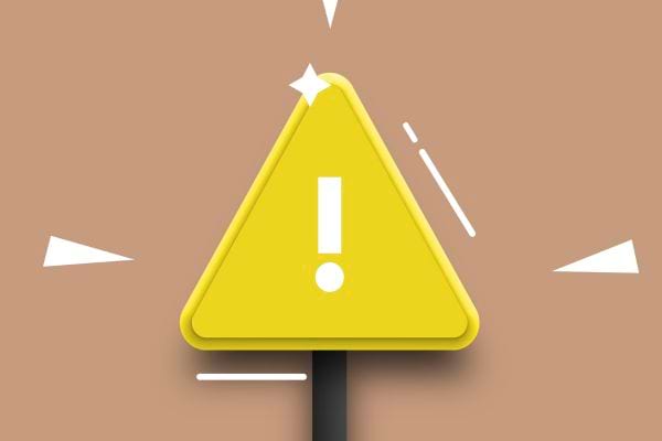 Panneau triangulaire jaune avec un point d’exclamation au centre.