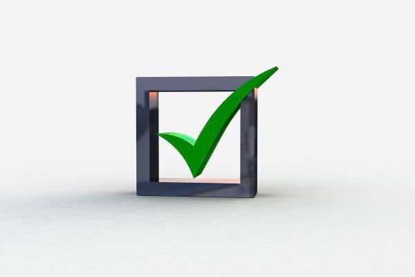 Icône verte avec une coche blanche validant une action.