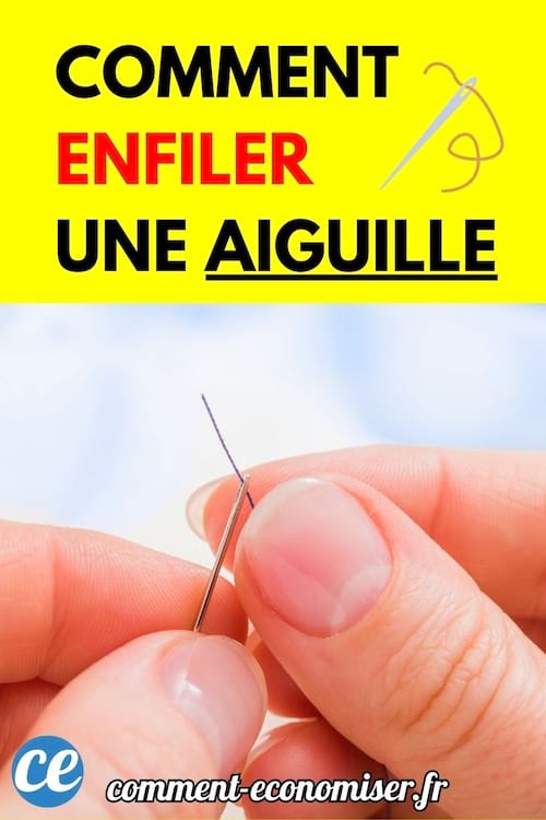 Mains tenant une aiguille avec fil.