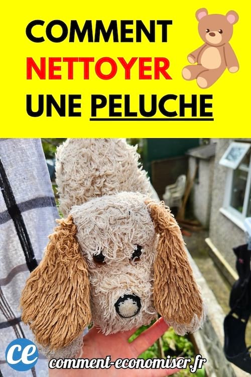Peluche chien sale tenue à la main.