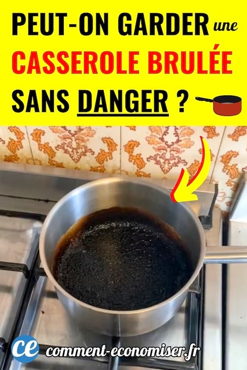 Une casserole brûlée sur une cuisinière à gaz en inox