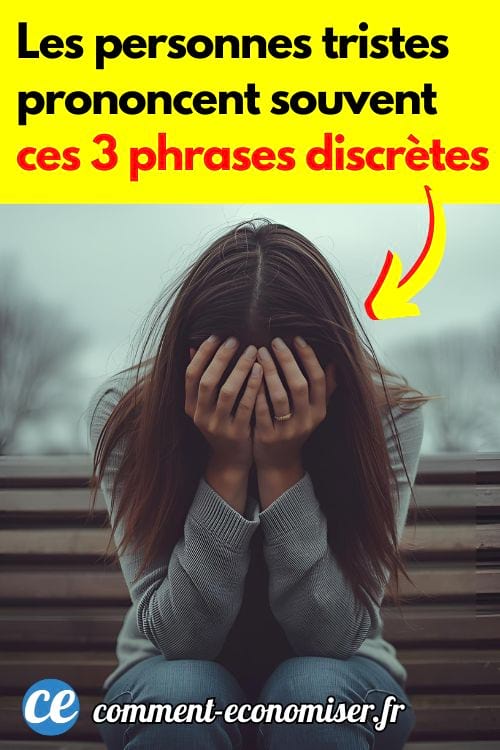 Une jeune femme triste sur un banc tient sa tête entre ses mains