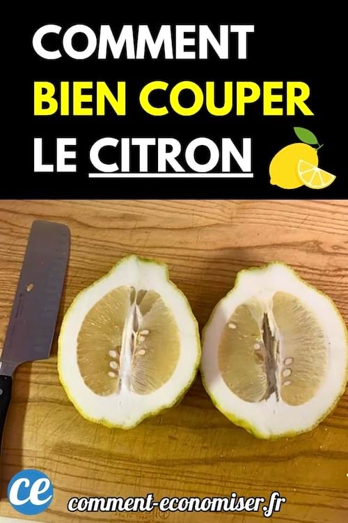 Citron coupé en deux sur une planche avec un couteau.