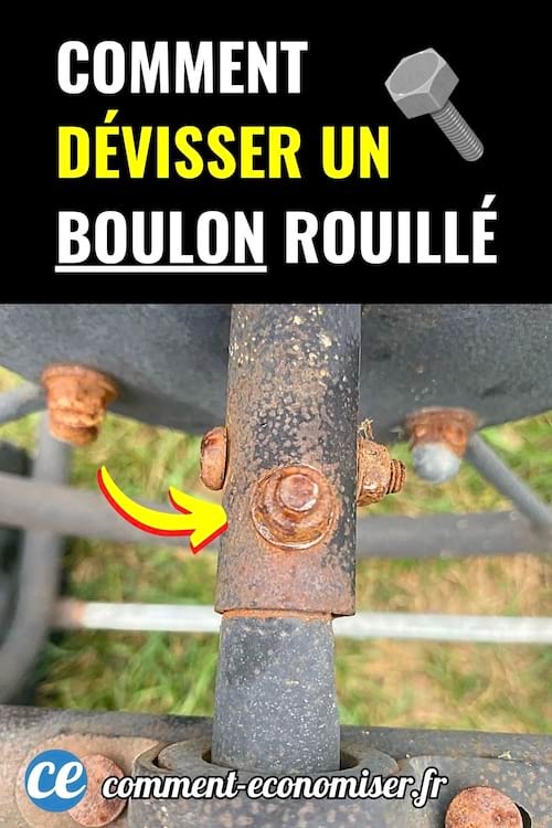 Boulon rouillé fixé sur une barre métallique, flèche jaune indiquant l’écrou.