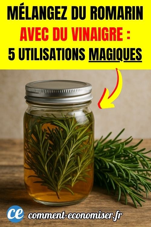 Un bocal avec du romarin qui macère dans du vinaigre, sur une table en bois